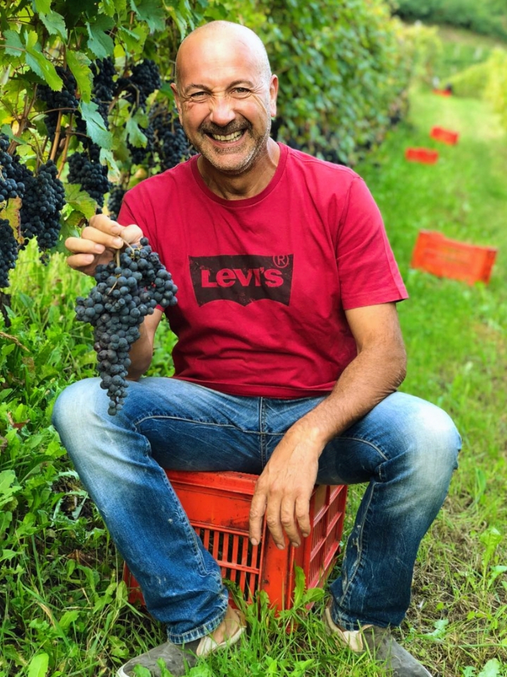 Piedmont winemaker in vineyard